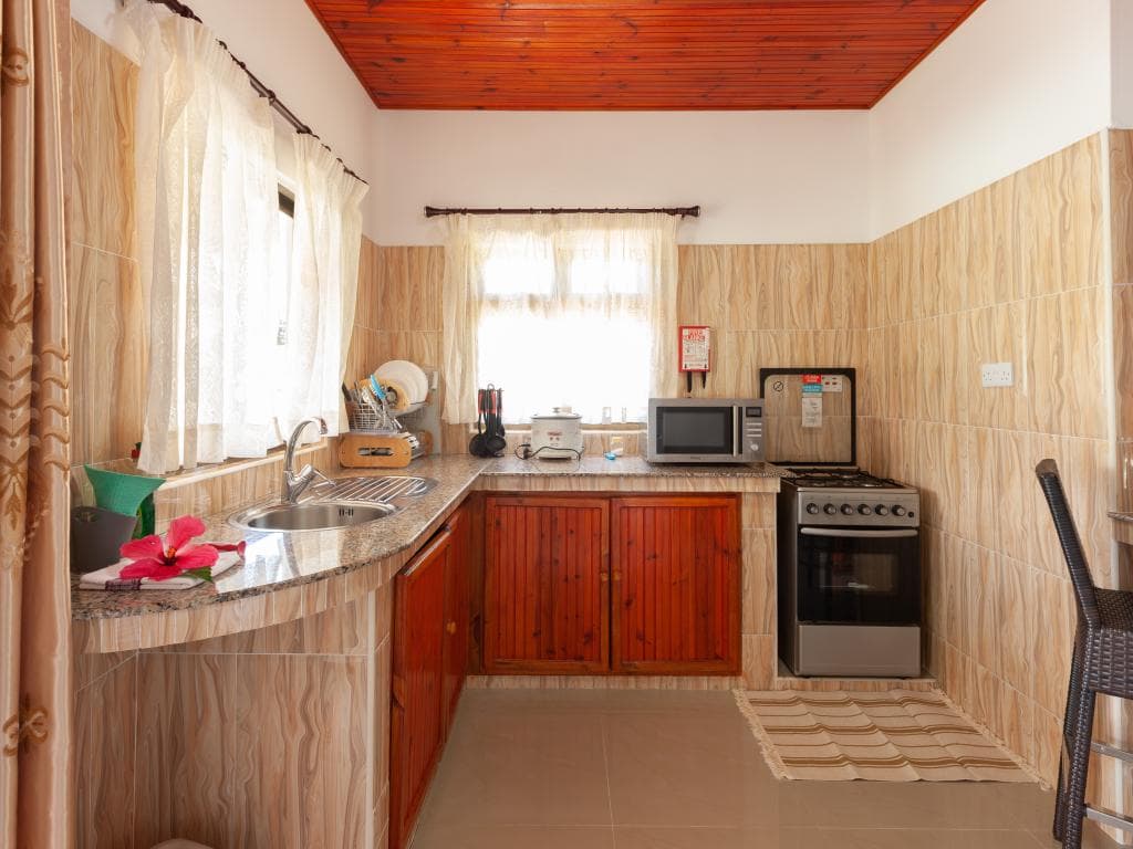 Studio Apartment — balcony with garden view