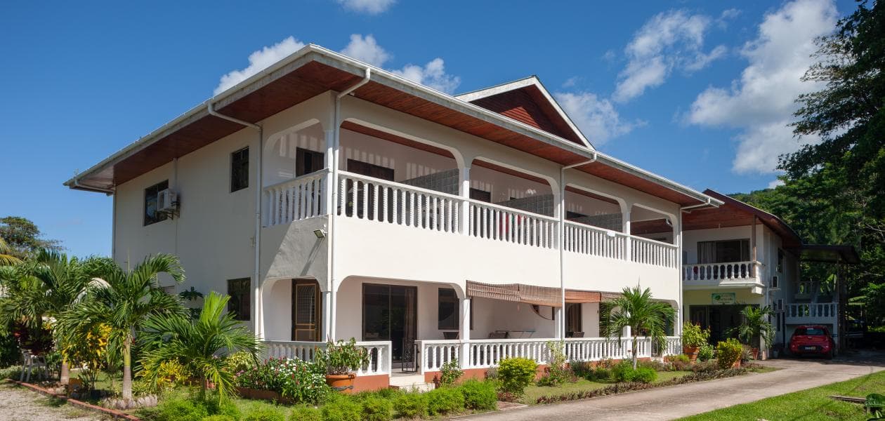 Tourterelle Holiday Home exterior — tropical garden setting in Grand Anse, Praslin